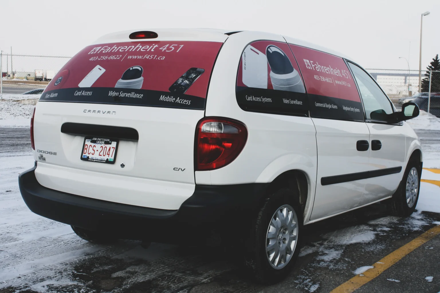 Perforated vehicle window decals