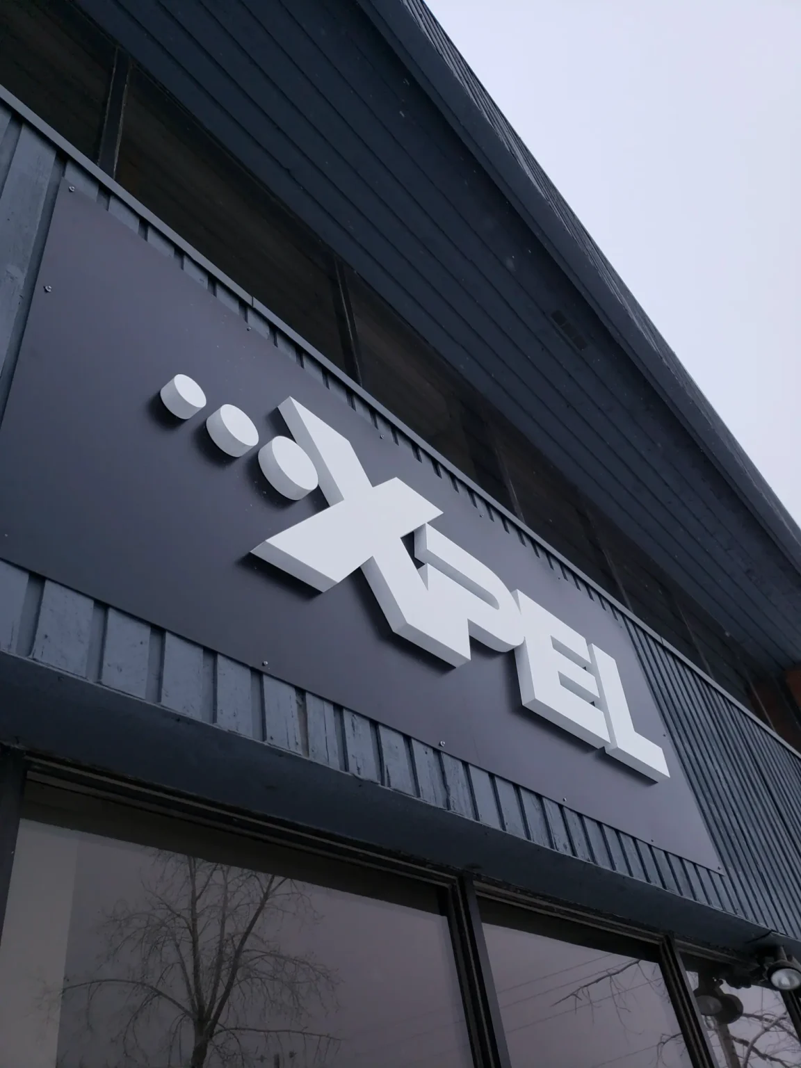 ...XPEL storefront sign