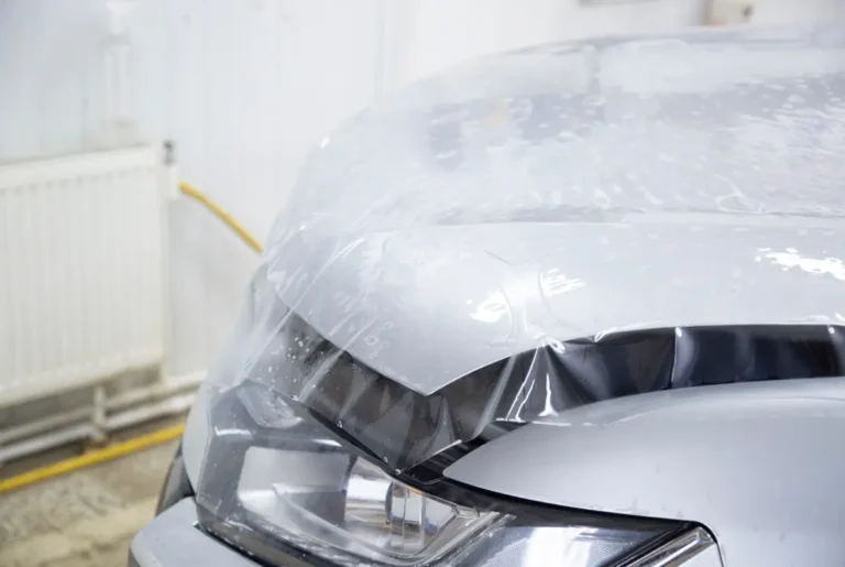 PPF being installed on the hood of a vehicle