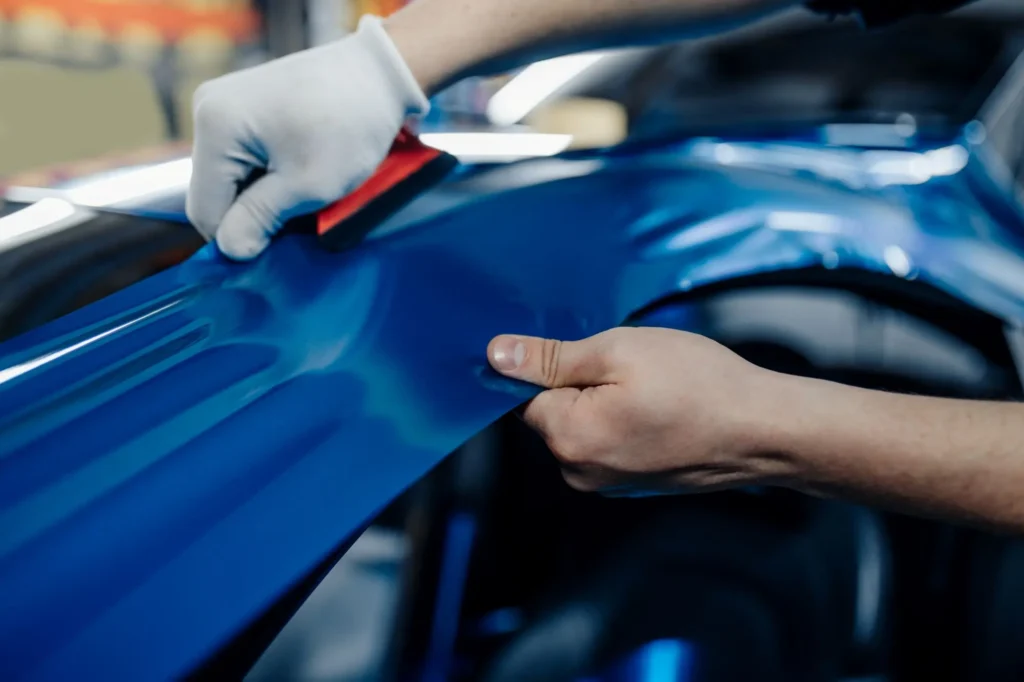 Current image: Vehicle wrap vs paint comparison showing cost durability and branding differences in Calgary conditions