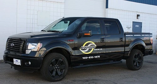 Black truck with custom Equinox sticker