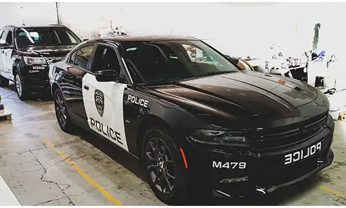 Police car with custom stickers