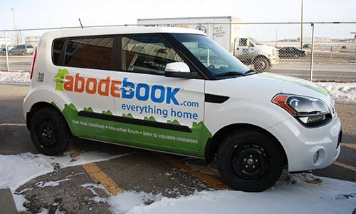 Kia Soul with custom Abode Book brand fleet decals